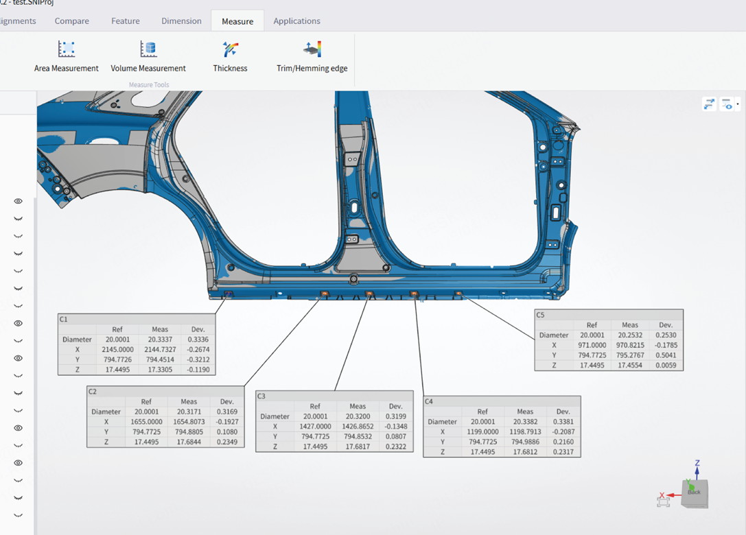 Automated inspection cell: a robot arm with a scanner over a part on a turntable, deviation map on the monitor