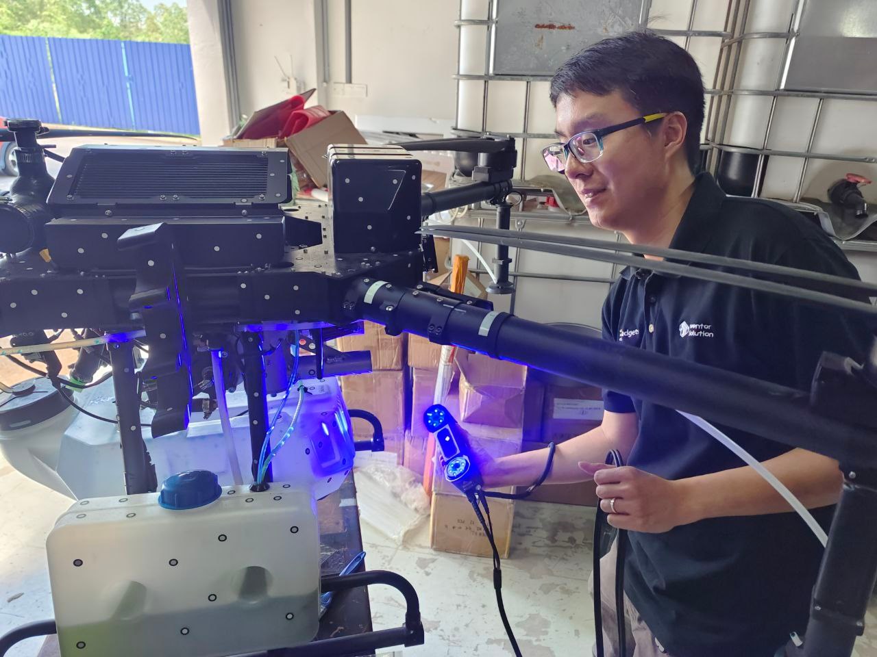 Handheld 3D scanner capturing a customer’s agricultural drone airframe for processing