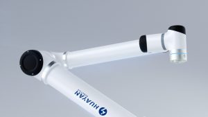 Close-up of a Huayan collaborative robot arm and tool flange