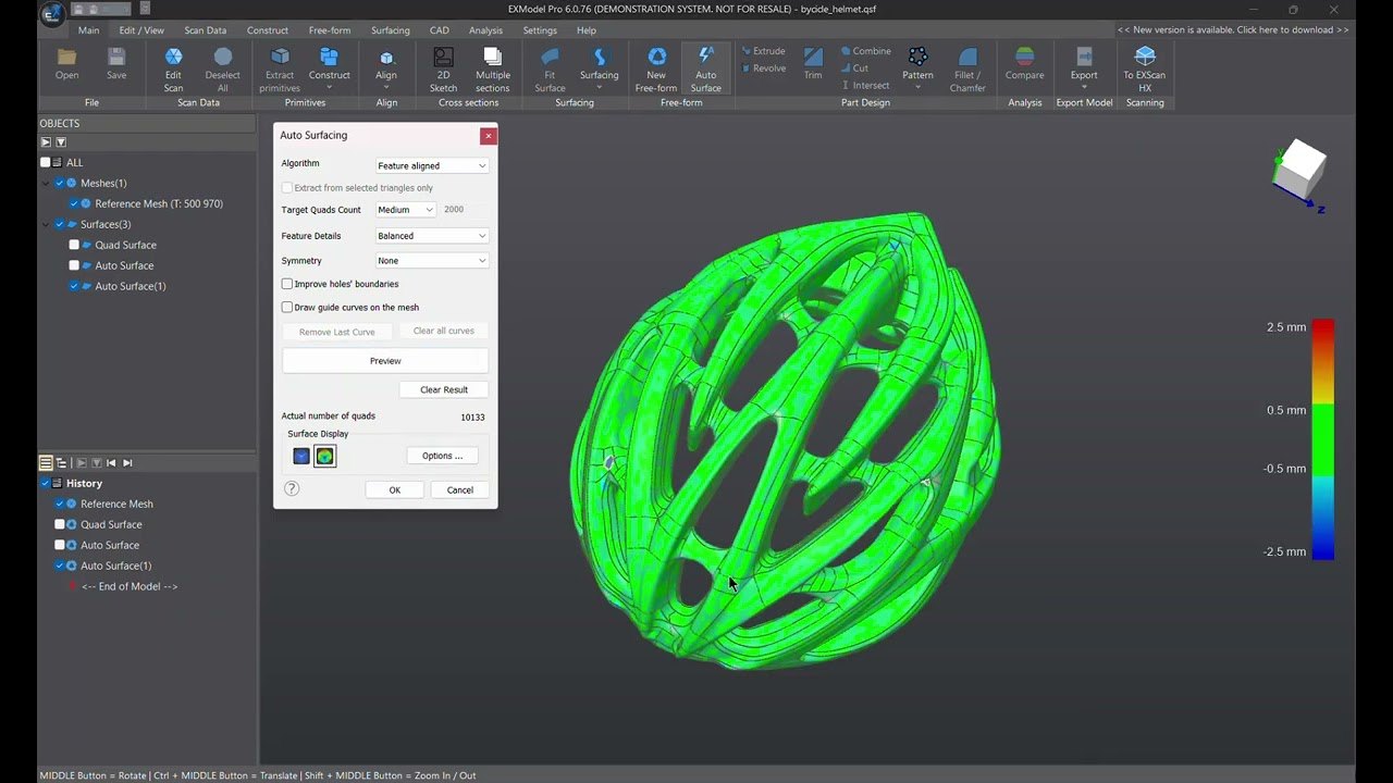 The EXModel Pro interface showing the Auto Surfacing dialog and a quad surface fitted to a scanned helmet model