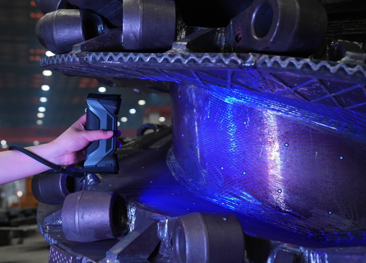 Laser scanning a large welded metal structure in a workshop