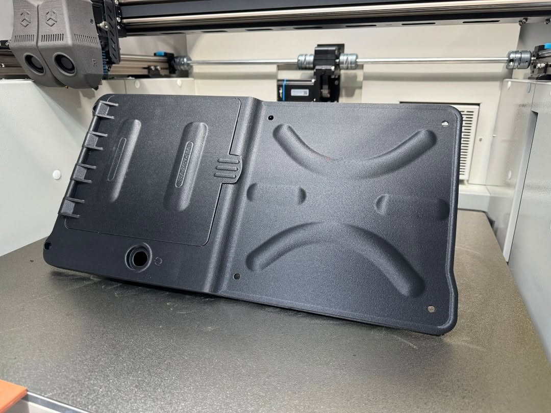 Large 3D printed panel sitting on the build plate of a CreatBot large format 3D printer