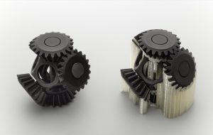 A printed gear assembly shown with soluble supports still in place and after removal
