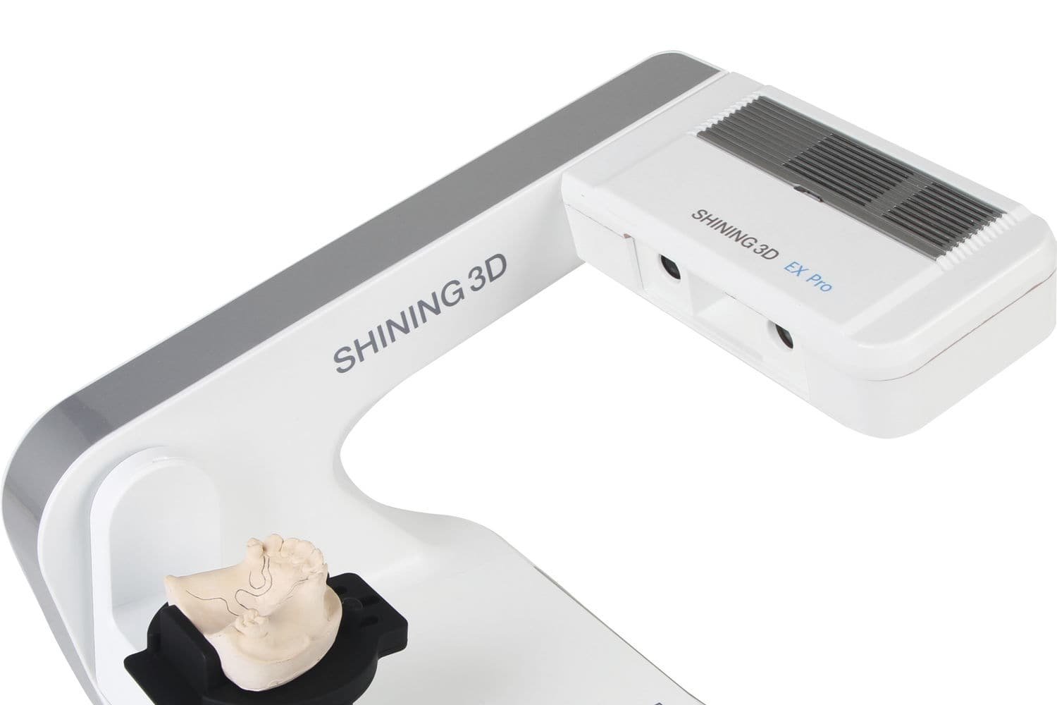 A Shining 3D DS-EX desktop dental lab scanner with a die model mounted on its rotating holder